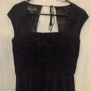 Sheer black dress. Cap sleeves.